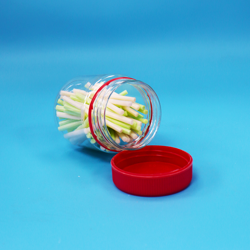 खाद्य ग्रेड पेंच लाल ढक्कन खाली छोटे स्पष्ट प्लास्टिक पीईटी मीठे भंडारण जार बिक्री के लिए