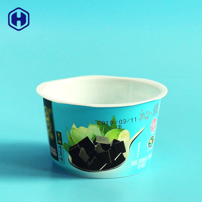 खाली छोटे प्लास्टिक आइसक्रीम कप चम्मच ढक्कन सौंदर्यबोध महसूस के साथ