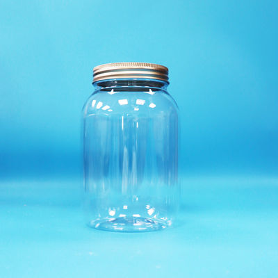 खाद्य ग्रेड स्पष्ट पीईटी प्लास्टिक गोल जार एल्यूमीनियम पेंच फ्लैट कैप खाद्य कैंडी नट्स के लिए