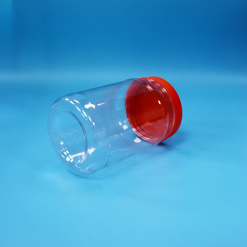 पारदर्शी पीईटी प्लास्टिक गोल खाद्य मिठाई कुकीज़ पैकेजिंग जार लाल रंग पेंच टोपी