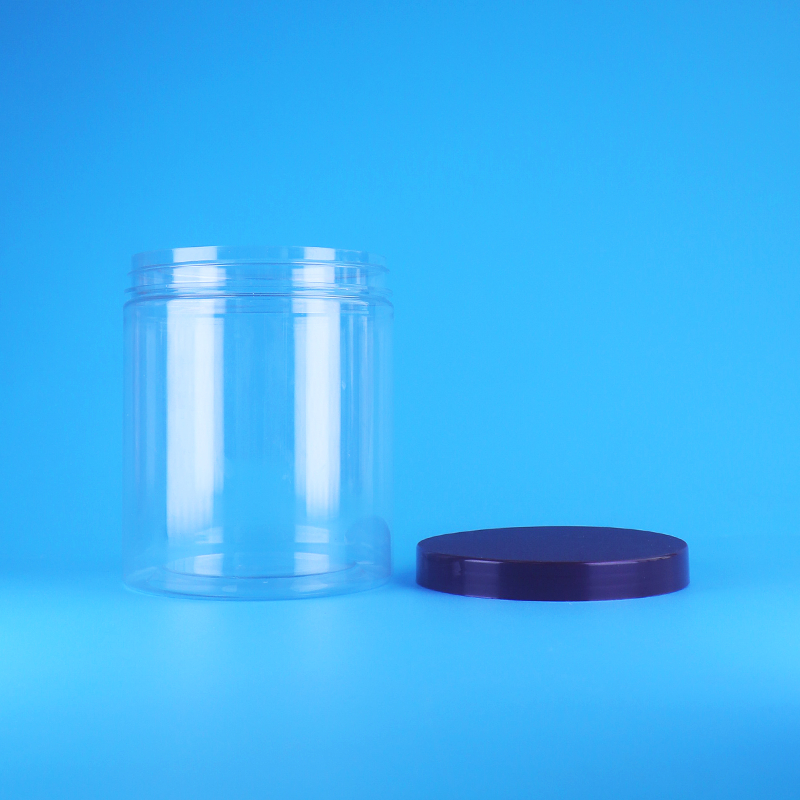 लीक प्रूफ स्क्रू फ्लैट ढक्कन गोल स्पष्ट पीईटी प्लास्टिक स्वीट ड्राई फ्रूट्स जार बीपीए मुक्त सूखे खाद्य पदार्थों के लिए कस्टम डिज़ाइन